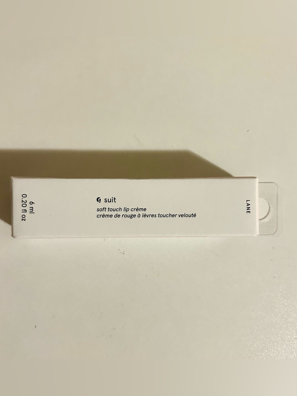 Glossier G Suit soft touch lip creme in Lane